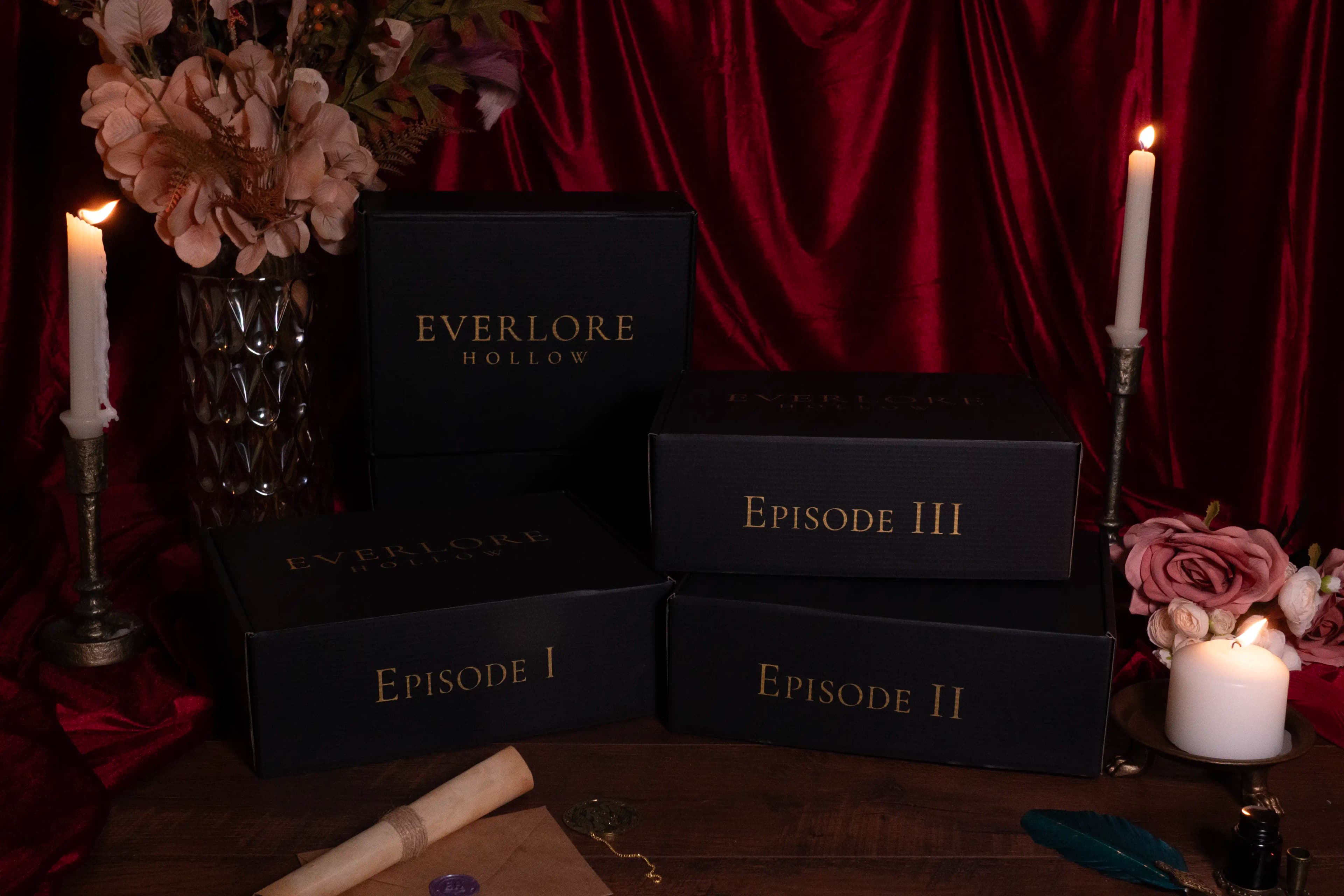 Four printed Everlore Hollow episodes arranged between lit candles